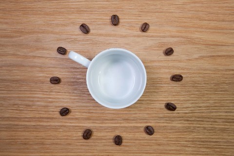 Coffee Time - Empty coffee cup and clock of coffee beans
