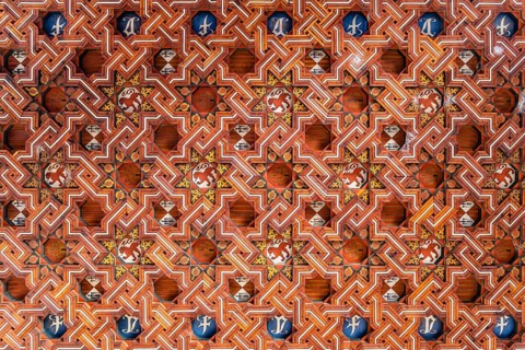 Toledo, Spain, December 6, 2019: Wooden coffered ceiling in the upper level of the cloister of San