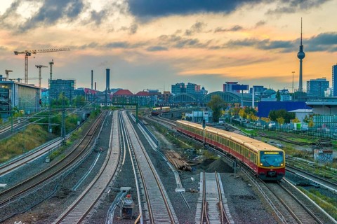 Berlin metro railway tracks with TV Tower in background