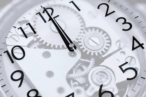 Twelve oclock (midnight or midday) on clock, double exposure