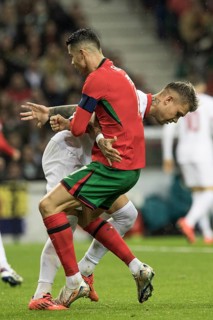 Football match, captain Cristiano RONALDO CR7 Portugal right, looking from the side in a duel with
