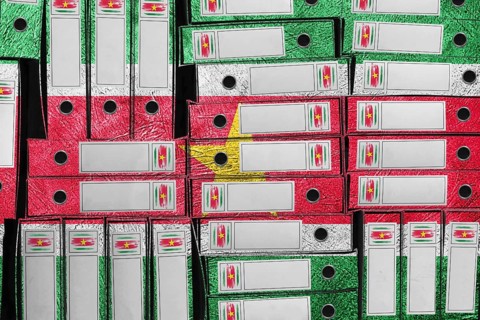 Suriname Flag Colors Folder Stack, Bureaucracy and Government Administration Concep