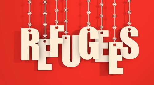 Image relative to migration from africa to european union. Refugees text hanging by barbed wire