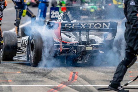 INDYCAR Series driver, SANTINO FERRUCCI (14) of Woodbury, Connecticut, brings his car in for