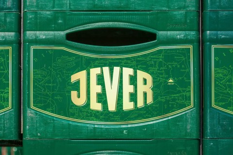 Stacked Jever beer crates in front of the Frisian Brewery, Jever Brewery, Jever, East Frisia, Lower