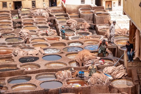FES, MOROCCO, ARIL 10, 2023, Famous tannery in the medina of Fes, where leather is being processed