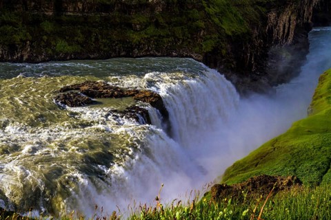 Gullfoss Golden Falls - the most beautiful waterfall in Iceland, on the Hvita River. Above the