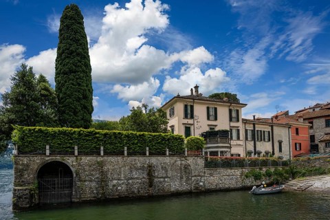 A view of a villa on Lake Como by an American actor in summer in Italy