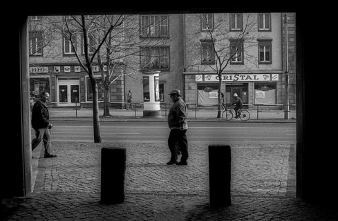 Germany, Merseburg, 15.01.1992, house passage, advertising pillar, street, citizen