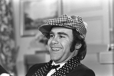 Elton John. English singer, songwriter born march 25 1947. Pictured wearing a chequered cap and a
