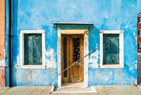 Bright blue color house in Burano, Venice