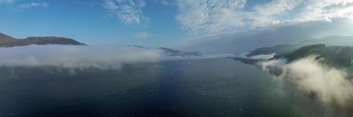Morning fog over Loch Linnhe at the narrows near Ardgour, drone image, Western Highlands, Scotland,