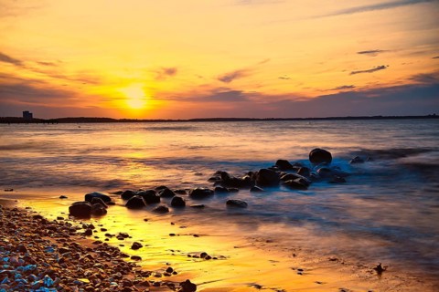 Sunset on the beach of Niendorf on the baltic sea