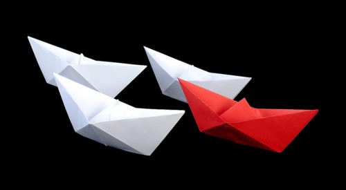Winner red paper ship. Leadership conception