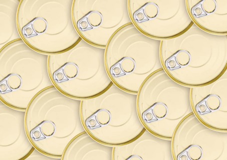 A lot of round golden cans with keys