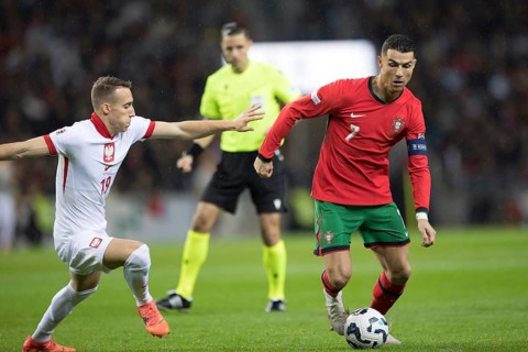 Football match, captain Cristiano RONALDO CR7 Portugal on the ball on the right in a duel with