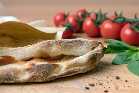 Pinsa romana and scrocchiarella gourmet italian cuisine. Traditional dish in italy