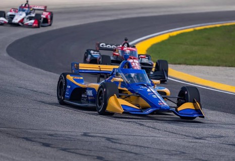 NTT INDYCAR SERIES driver, KYFFIN SIMPSON (R) (4) (BRB) of Bridgetown, Barbados races through the