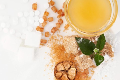 Various types of sugar - brown, white, crystal, powdered and cane sugar, artificial sweetener, monk