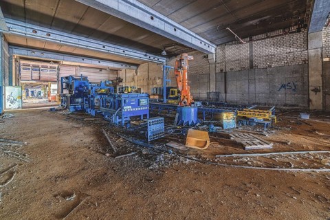 Abandoned industrial hall with decommissioned machinery and production facilities, Metallwerke