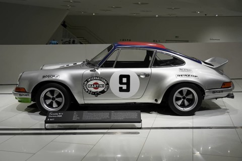 Porsche 911 Carerra RSA silver Porsche 911 on display in the museum with Martini Racing design, New