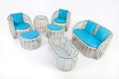 Suite of wicker furniture made of synthetic fibre on isolated background
