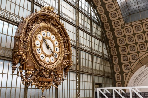PARIS, FRANCE, MAY 29, 2022, Ornate clock at the main hall of famous museum d'Orsay in Paris,
