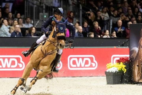 Denis Lynch of Ireland competes in the equestrian Audi Grand Prix at Jumping International