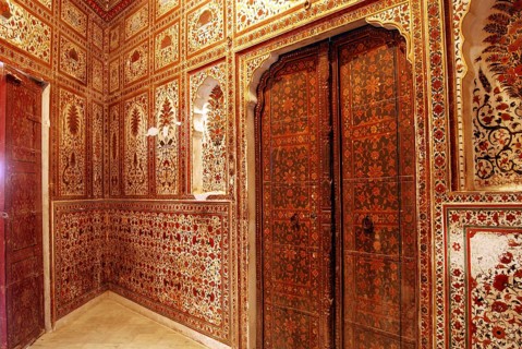 Painting on wall and wooden door in gallery of Gajraj Mahal in Junagarh fort, Bikaner, Rajasthan,