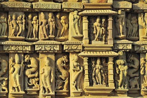 Intricately carved wall of parsvanatha temple Khajuraho madhya pradesh india