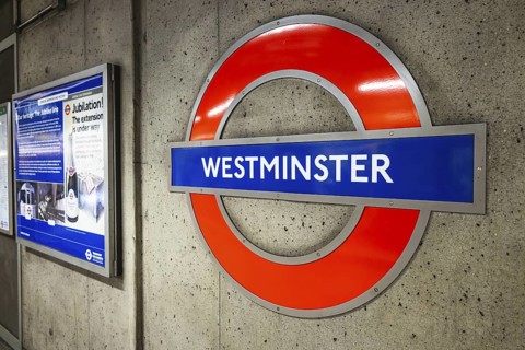 Westminster station roundel in the London Underground, showcasing classic subway design and British