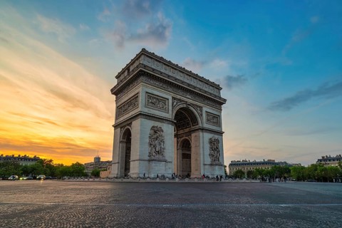 Paris France, city skyline sunset at Arc de Triomphe and Champs Elysees