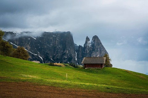 Panoramic view of Mount Sciliar from Alpe di Siusi in the Dolomites in South Tyrol, Italy