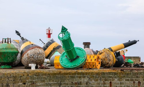 Buoys lying on the land, harbour Port de Brest, department Finistere Penn-ar-Bed, region Bretagne