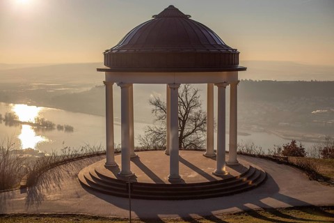 Beautiful temple in a landscape shot. Sunrise on a winter morning. Beautiful view along the Rhine