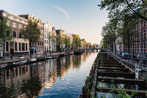 Amsterdam, Netherlands, May 5, 2022: Old typical Amsterdam houses in Red Light District. De Wallen