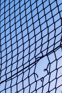 Hole in a net, symbolising imprisonment, obstacle, hope, damage Austria