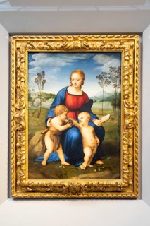 Florence, Italy, June 2022: Madonna and Child with Young St John the Baptist, also named Madonna of