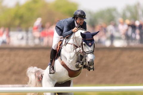 Daniel Bluman of Israel and riding Corbie V.V., compete in the 1.60m Grand Prix during The