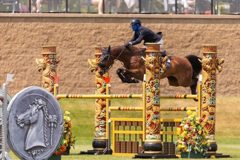 Conor Swail, from Ireland and riding Casturano, compete in the 1.60m Grand Prix during The