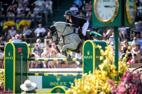 Martin Fuchs of Switzerland and riding Leone Jei compete in the first round of the 1.60m CPKC