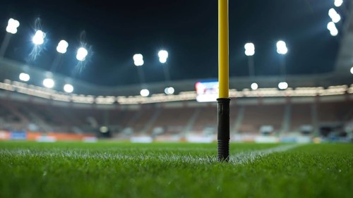Close up flag's pole in the corner of soccer pitch