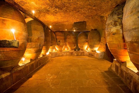 Antique winery in Spain with clay vessels terracotta amphora pots Mediterranean tradition with