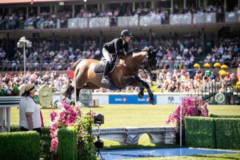 Katie Laurie of Australia and riding Django II compete in the first round of the 1.60m CPKC