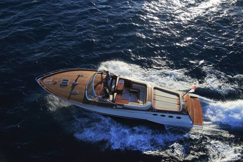 Aerial view sports boat J Craft 42 Torpedo R at full speed on the Cote d'Azur, luxurious motorboat
