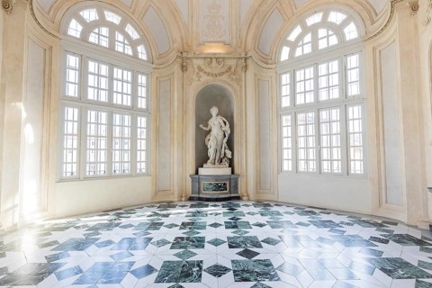 Venaria Reale, Italy, January 2023: luxury interior old royal palace. Gallery perspective with