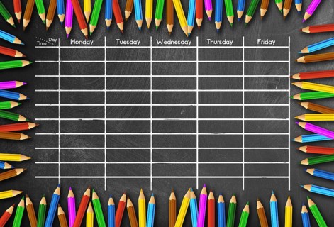 school timetable or class schedule template on blackboard framed by colored pencils