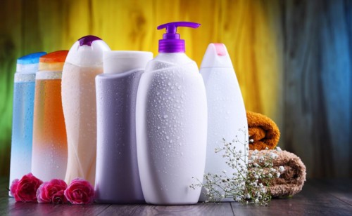 Plastic bottles of body care and beauty products