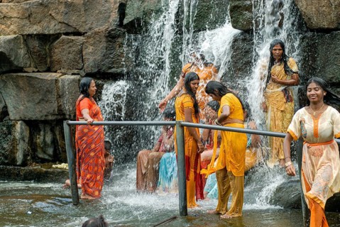 Tourists enjoying the Kodiveri waterfalls near Sathyamangalam, Tamil Nadu, South India, India, Asia