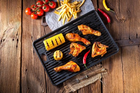 Rustic Grilled chicken wings, legs, and spicy corn